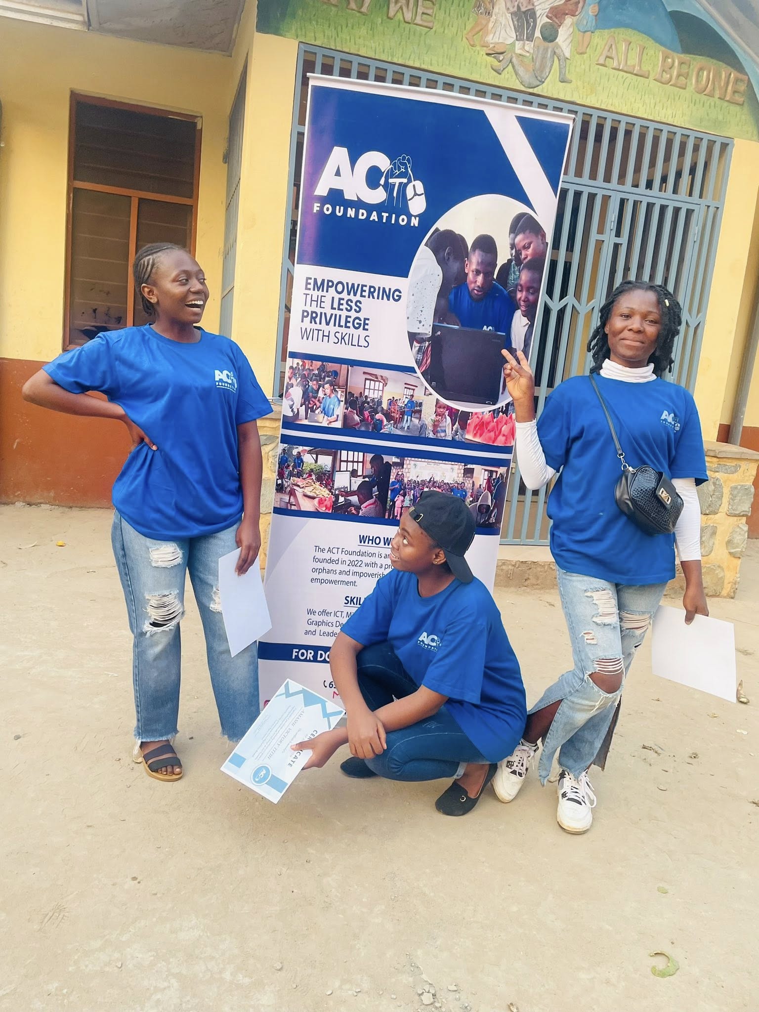 Volunteers with ACT banner